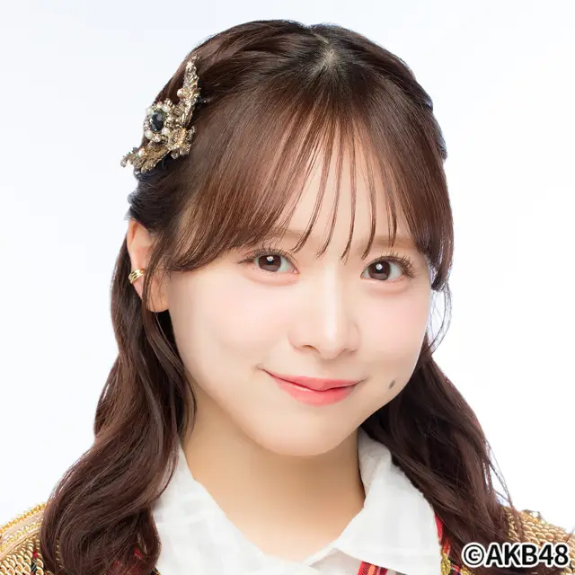 倉野尾成美
